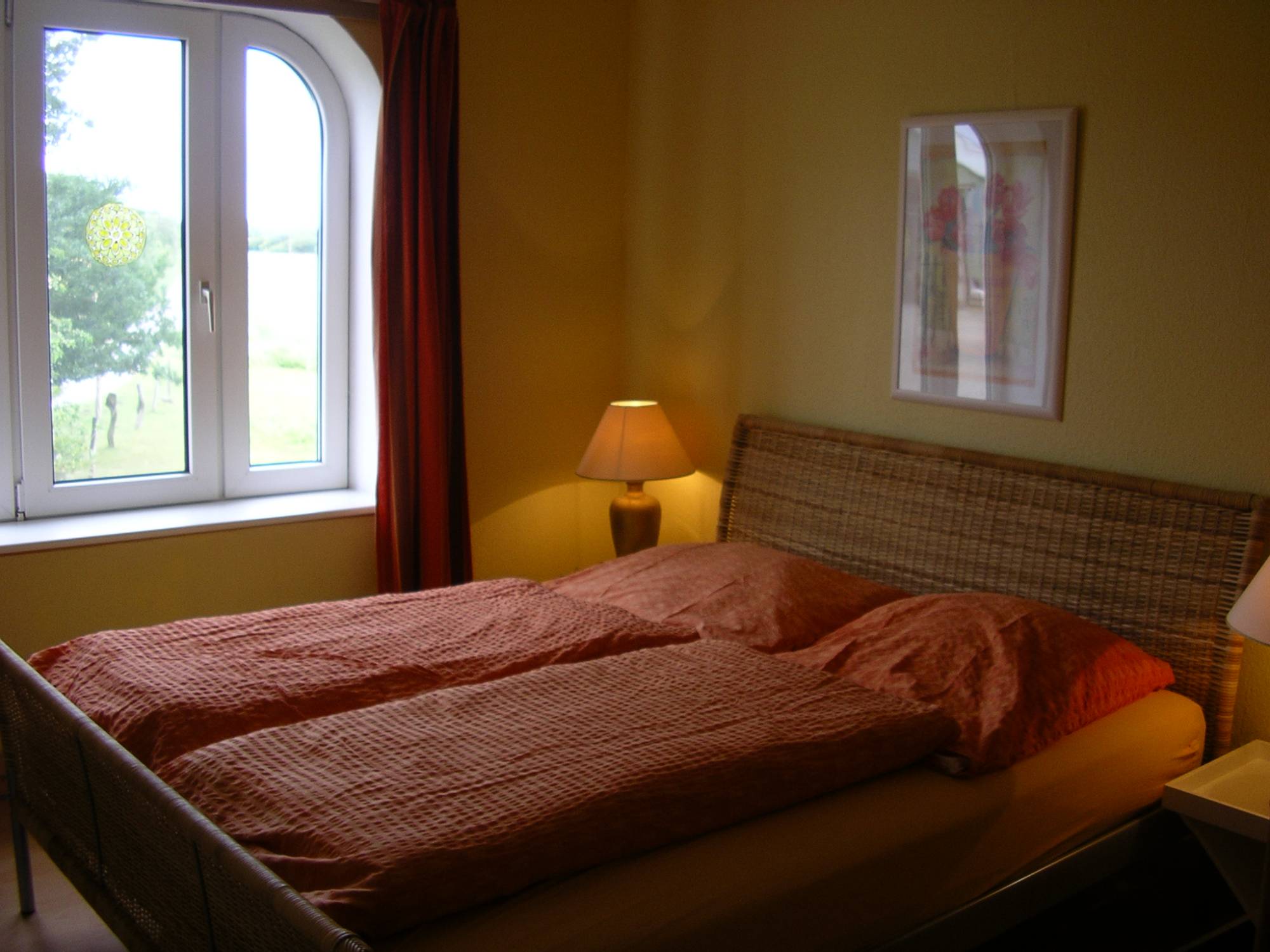 Oberes Schlafzimmer mit Doppelbett